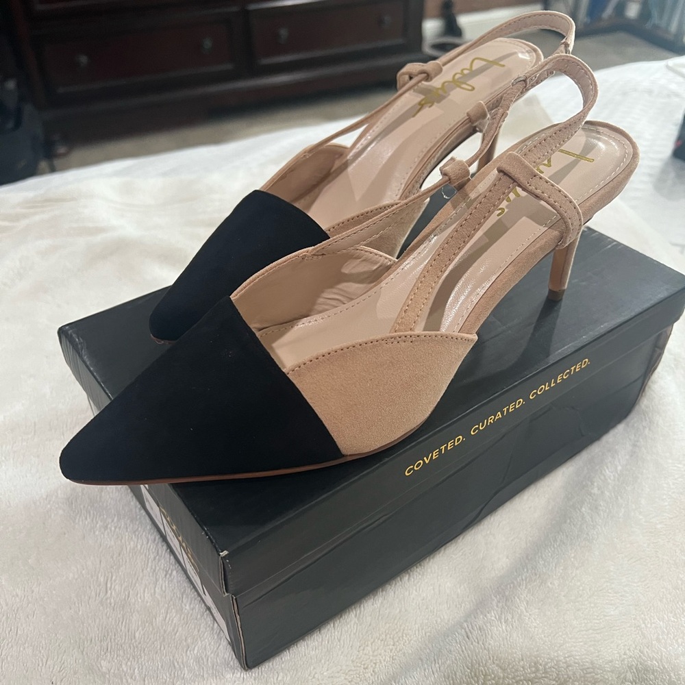Brand New - size 8.5 Heels Black/Nude.  Classy!